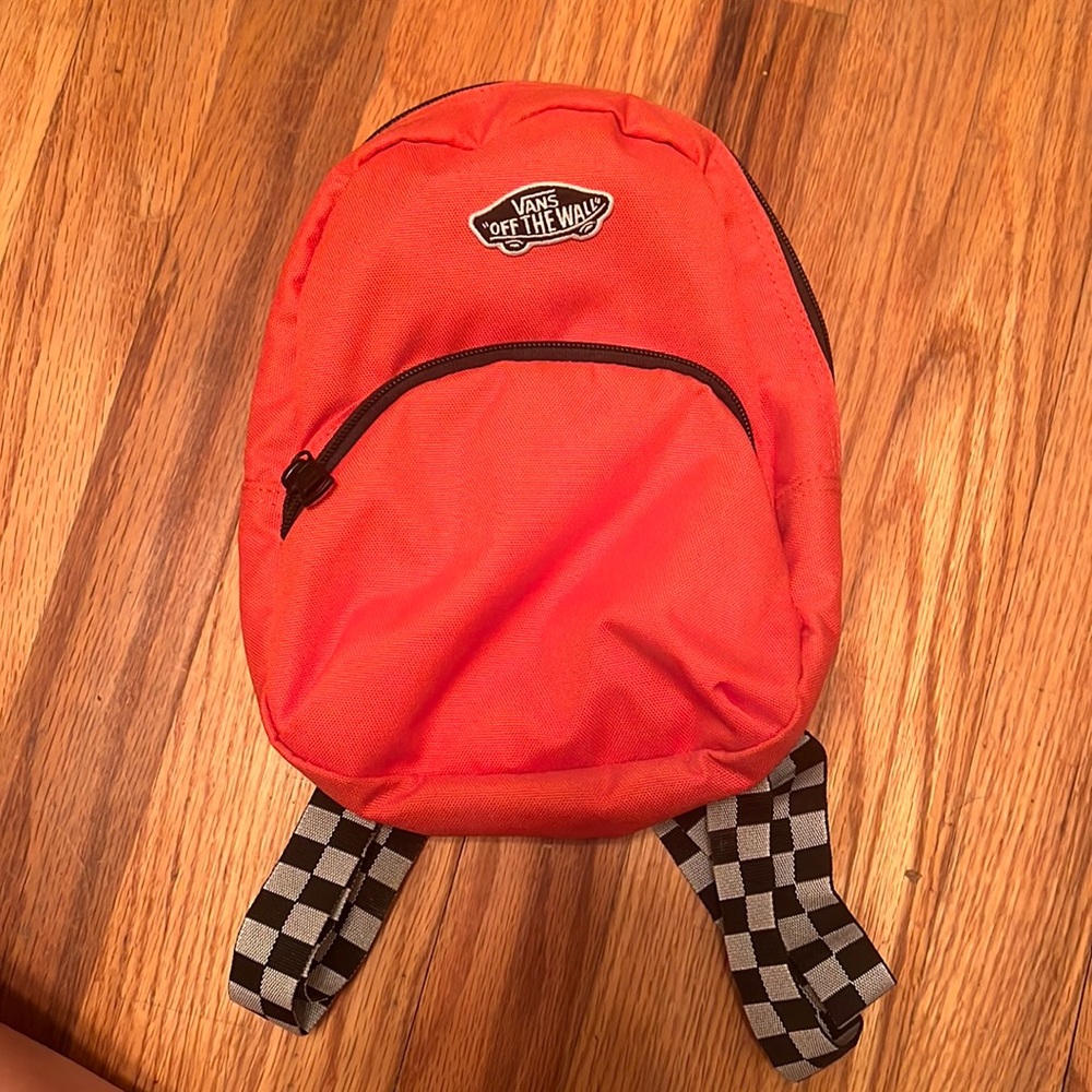 Mini off the wall orange and checkered back pack
